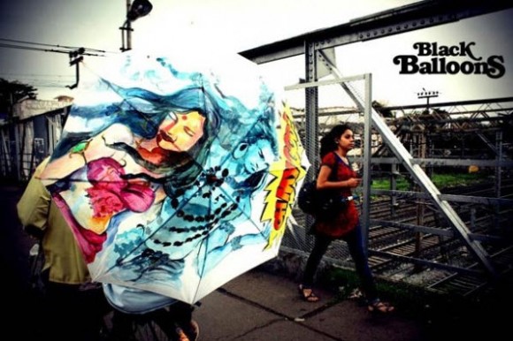 Colorful Hand Painted Umbrellas by Black Balloons